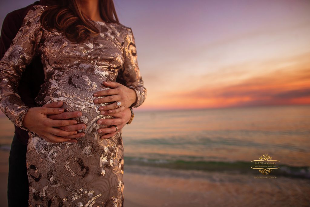maternity picture at grayton beach at sunset in sequin dress